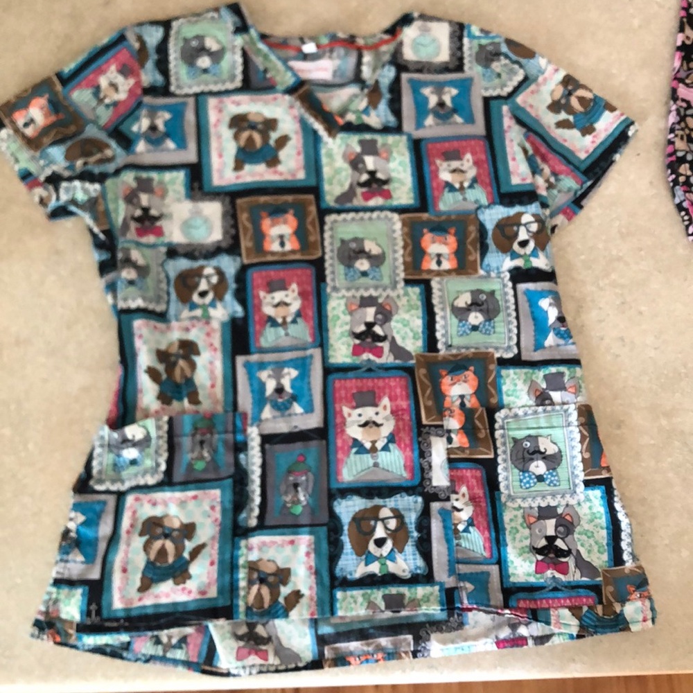 Cute scrub top & bottom with cats and dogs on it